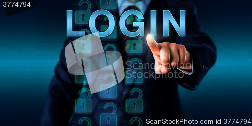 Image of Corporate User Pushing LOGIN Onscreen