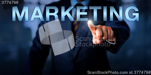 Image of Marketeer Pointing At MARKETING Onscreen