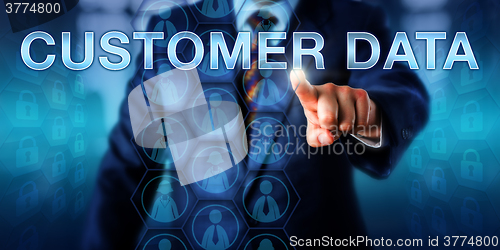 Image of Businessman Pushing CUSTOMER DATA Onscreen