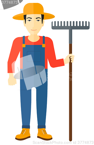 Image of Farmer with rake.