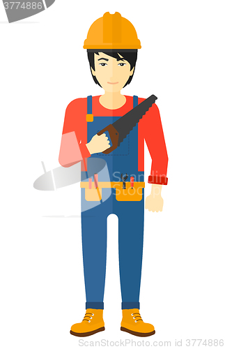 Image of Smiling worker with saw.