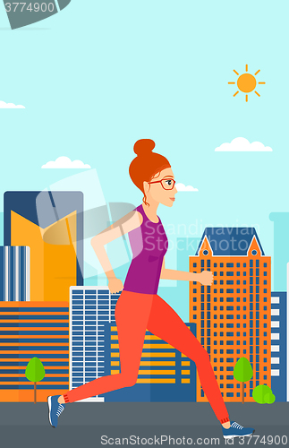 Image of Sportive woman jogging.