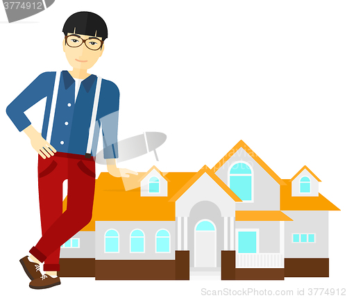 Image of Real estate agent offering house.