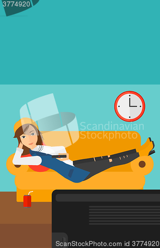 Image of Woman lying on sofa.