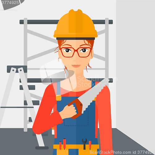 Image of Smiling worker with saw.