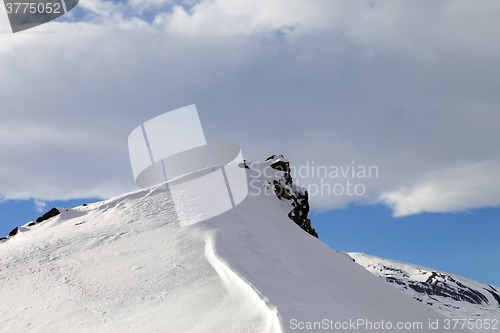 Image of Top of mountains with snow cornice after snowfall