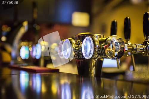 Image of Metallic beer taps