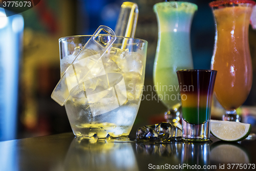 Image of cocktails on bar background