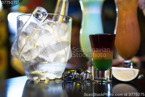 Image of cocktails on bar background