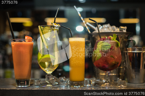 Image of cocktails on bar background