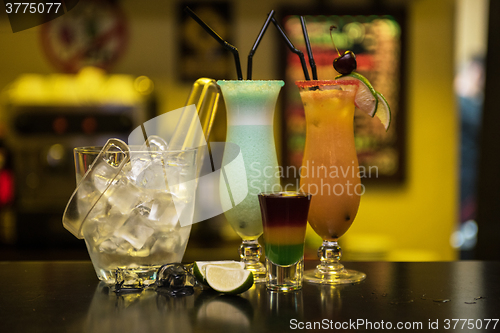 Image of cocktails on bar background