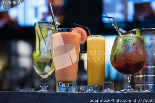 Image of cocktails on bar background