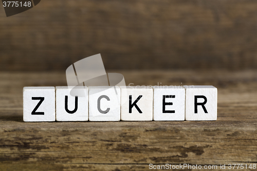 Image of The German word sugar written in cubes