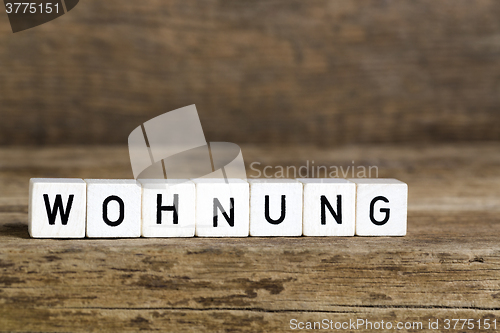 Image of The German word apartment written in cubes