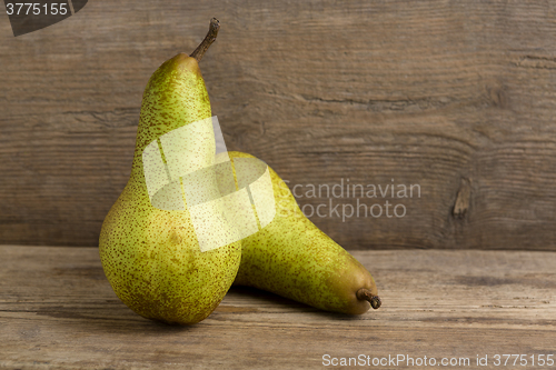 Image of Pears on wooden background