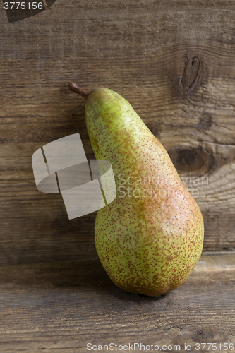 Image of Pear on wooden background