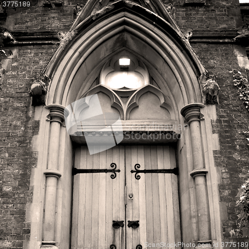 Image of wooden parliament in london old church door and marble antique  