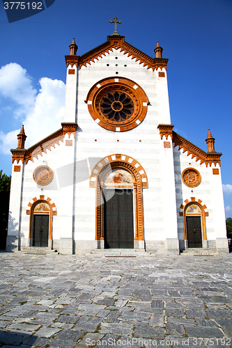 Image of  church  in  the mercallo    closed brick tower sidewalk italy  