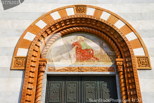 Image of  church door    italy  lombardy   jesus