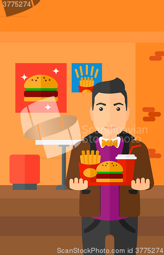 Image of Man with fast food.