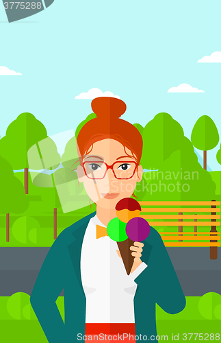 Image of Woman holding icecream.