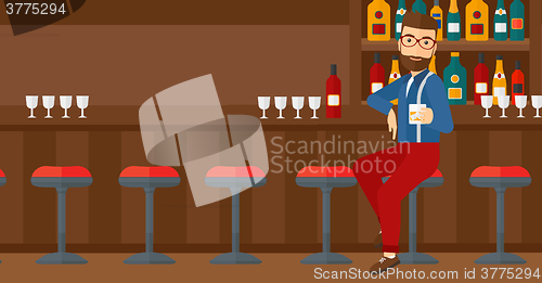 Image of Man sitting at bar.