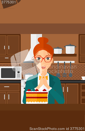Image of Woman looking at cake.