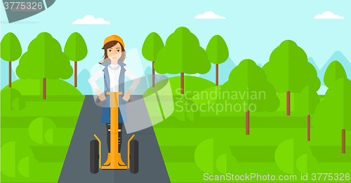 Image of Woman riding on electric scooter.