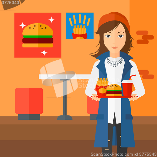 Image of Woman with fast food.