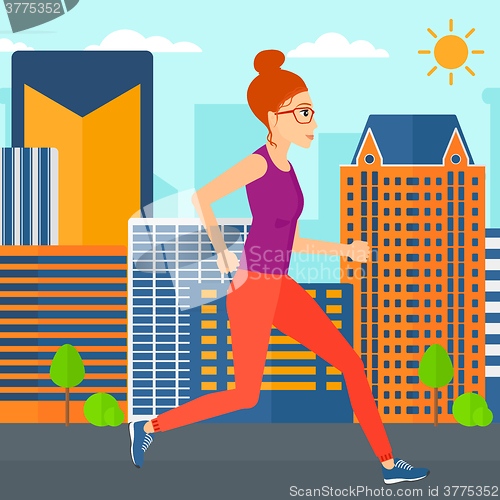 Image of Sportive woman jogging.