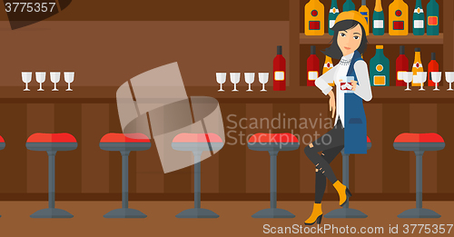 Image of Woman sitting at bar.