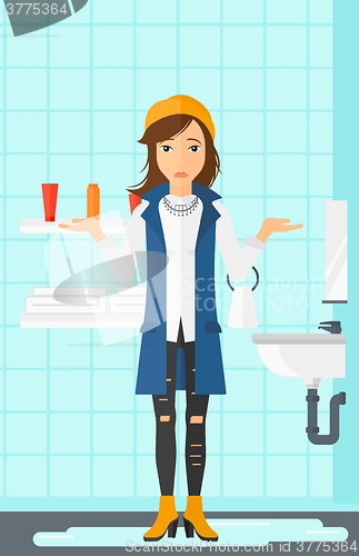 Image of Woman in despair standing near leaking sink.