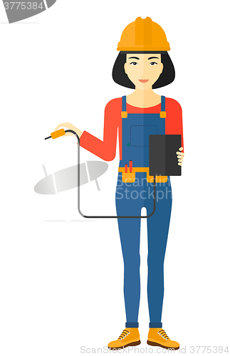 Image of Electrician with electrical equipment.