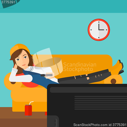 Image of Woman lying on sofa.