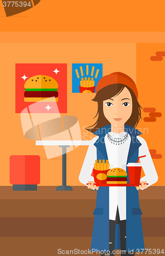 Image of Woman with fast food.