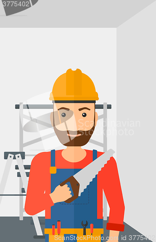 Image of Smiling worker with saw.