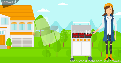 Image of Woman preparing barbecue.