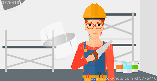 Image of Smiling worker with saw.