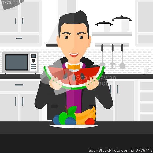 Image of Man eating watermelon.