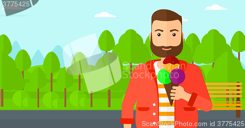 Image of Man holding icecream.