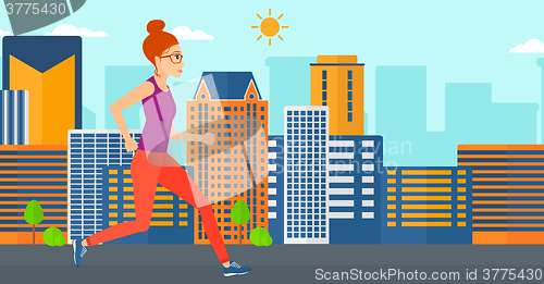Image of Sportive woman jogging.