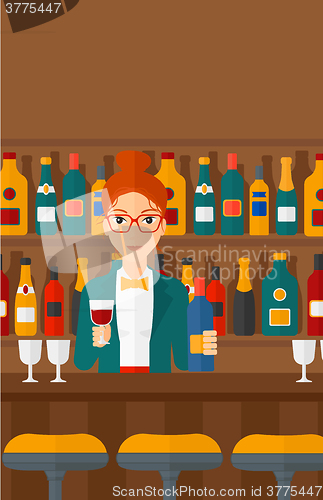Image of Bartender standing at the bar counter.