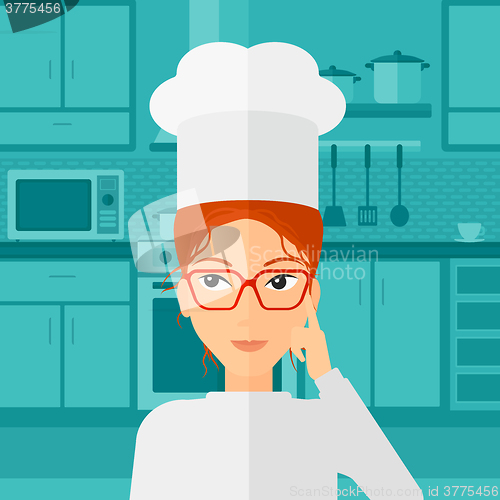 Image of Chef pointing forefinger up.