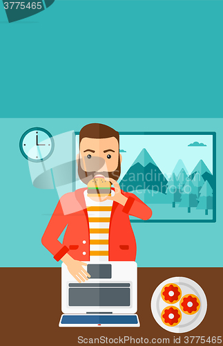 Image of Man eating hamburger. 