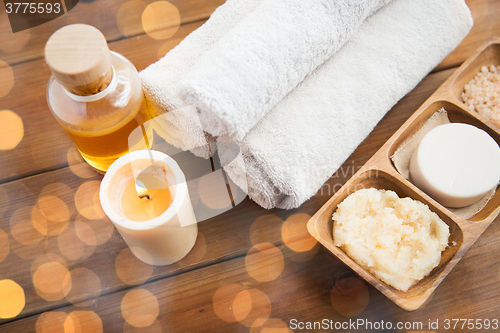 Image of close up of natural cosmetics and bath towels