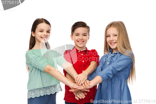 Image of happy boy and girls with hands on top