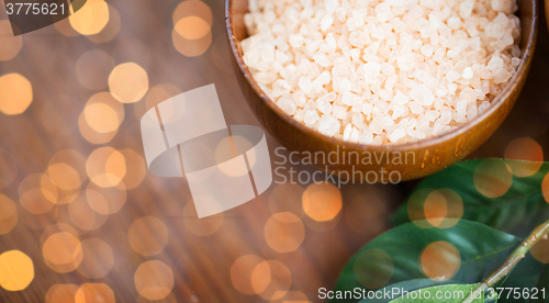 Image of close up of himalayan pink salt in wooden bowl