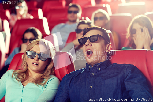 Image of friends watching horror movie in 3d theater