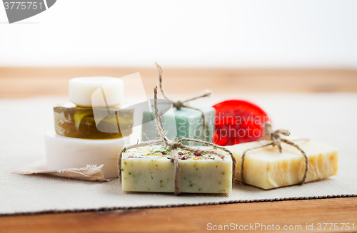 Image of close up of handmade soap bars on wood