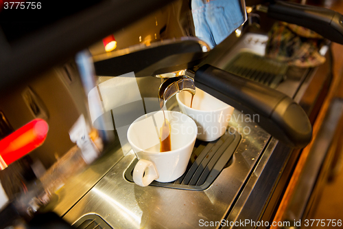 Image of close up of espresso machine making coffee